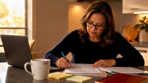 CPA reviewing owner compensation papers