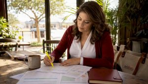 CPA reviewing tax documents in office