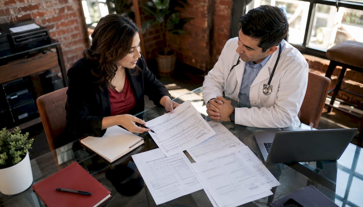 Accountant advising medical practice client